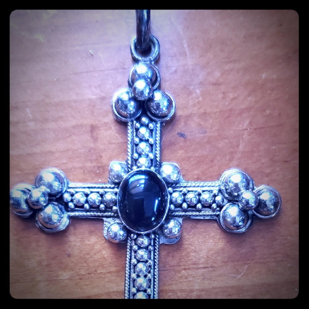 Sterling silver cross pendant with black onyx
